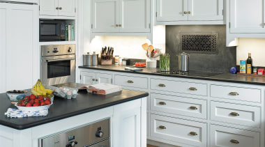 A view of the kitchen, wooden flooring and cabinetry, countertop, cuisine classique, floor, flooring, hardwood, home, home appliance, interior design, kitchen, kitchen appliance, kitchen stove, room, white, gray