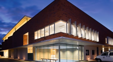 A view of the Auckland Grammar Sports Centre. architecture, building, commercial building, corporate headquarters, elevation, facade, home, house, mixed use, real estate, residential area, sky, window, blue