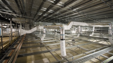 A view of the air conditioning system. - architecture, building, daylighting, metropolitan area, public transport, structure, track, train station, black, gray