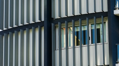 A view of some louvres from Lowline. - architecture, building, commercial building, condominium, daytime, facade, glass, line, metropolis, metropolitan area, structure, tower block, urban area, window, black, gray