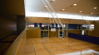 A view of the gymnasium. - A view architecture, ceiling, daylighting, floor, flooring, interior design, leisure centre, lobby, sport venue, structure, wood, brown