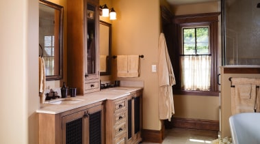 A view of a bathroom, tiled floor. cream bathroom, cabinetry, ceiling, countertop, floor, flooring, home, interior design, kitchen, room, brown, gray