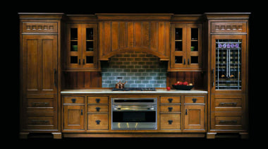 view of this kitchen featuring stained wood cabinetry, cabinetry, cupboard, furniture, hardwood, kitchen, wood, wood stain, black, brown