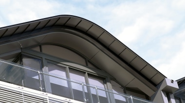 view of the saunders wharf apartments with all architecture, building, commercial building, daylighting, facade, roof, sky, structure, window, white