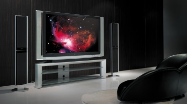 A view of a home audio system by display device, flat panel display, furniture, hearth, home appliance, interior design, living room, multimedia, product design, technology, television, black