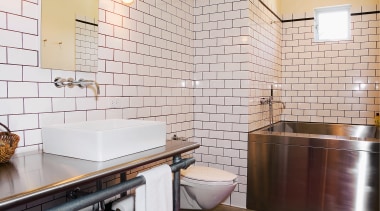 view of this bathroom featuring subway tiles on architecture, bathroom, ceiling, countertop, daylighting, floor, flooring, home, interior design, real estate, room, tile, wall, wood, gray