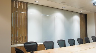 A view of a air conditioning system by architecture, ceiling, conference hall, daylighting, furniture, interior design, light fixture, lighting, office, table, black, orange