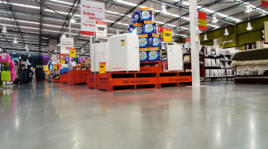 A view of some concrete flooring constructed by factory, manufacturing, warehouse, gray