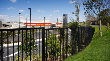 view of the fencing installed around  sylvia fence, grass, home fencing, house, outdoor structure, plant, real estate, residential area, sky, structure, tree, brown