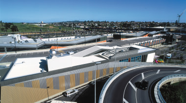 A view of some building materials from Dimond. building, car, city, metropolitan area, road, roof, sky, structure, transport, urban area, black