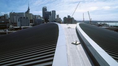 view of the Dimond Dimondek 630 roofing profile architecture, bridge, building, city, condominium, daytime, downtown, fixed link, infrastructure, line, metropolis, metropolitan area, roof, sky, skyline, skyscraper, skyway, structure, tower block, urban area, white, black