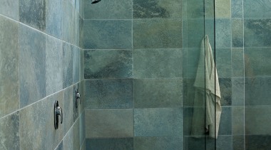 A view of a tiled shower from Ceramic architecture, bathroom, floor, flooring, glass, plumbing fixture, room, shower, tile, wall, gray