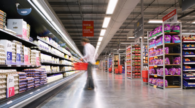 A view of some construction work by Naylor aisle, grocery store, inventory, product, retail, supermarket, gray, black