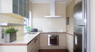 A view of a kitchen designed by YellowFox. cabinetry, countertop, cuisine classique, interior design, kitchen, property, real estate, room, gray, white