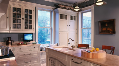 A view of this kitchen that features a cabinetry, ceiling, countertop, cuisine classique, flooring, home, interior design, kitchen, real estate, room, window, gray
