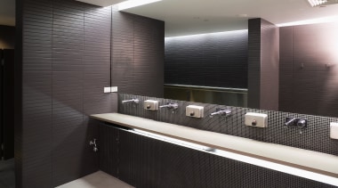 A view of some plubing by Beavis and bathroom, interior design, room, sink, black, gray