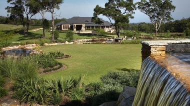 View of the landscaped gardens around the golf cottage, estate, grass, home, house, land lot, landscape, lawn, property, real estate, tree, yard, brown