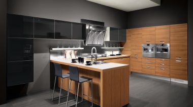 View of kitchen with wood grain cabinetry, grey cabinetry, countertop, cuisine classique, floor, furniture, interior design, kitchen, product design, room, black