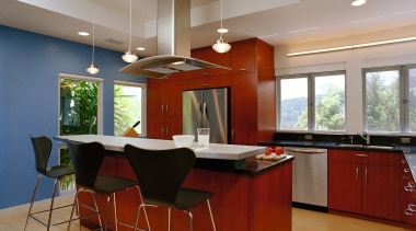 A view of this contemporary kitchn featuring gherry cabinetry, ceiling, countertop, flooring, interior design, kitchen, real estate, room, gray