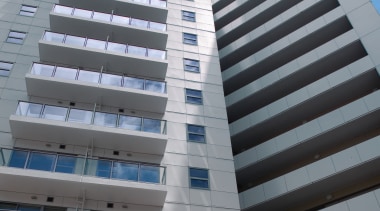 A view of some cladding by PBS Group. apartment, architecture, building, commercial building, condominium, corporate headquarters, daytime, facade, headquarters, hotel, metropolis, metropolitan area, mixed use, property, real estate, residential area, sky, skyscraper, tower block, gray