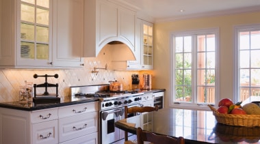 A view of the kitchen, wooden flooring, cabinetry cabinetry, countertop, cuisine classique, home, interior design, kitchen, real estate, room, window, gray