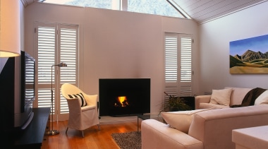 A view of the living area featuring carpet architecture, ceiling, daylighting, floor, flooring, hardwood, hearth, house, interior design, laminate flooring, living room, real estate, room, wall, wood, wood flooring, gray, red