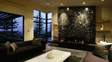A view of a fireplace from Living Flame. ceiling, home, interior design, lighting, living room, lobby, room, wall, black, brown