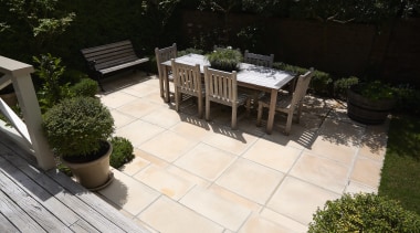 A view of some paving from Jagas Paving. backyard, courtyard, deck, floor, flooring, landscaping, outdoor structure, patio, property, walkway, yard, black, white