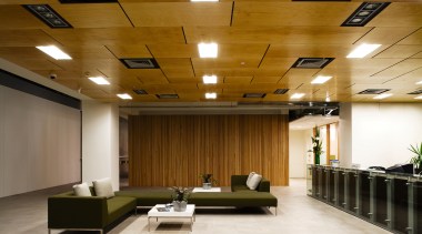 A view of the DOC offices. - A auditorium, ceiling, conference hall, floor, flooring, interior design, lobby, brown