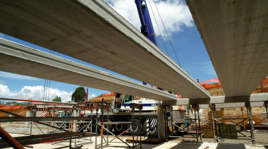 A view of some reinforced concrete planks from architecture, bridge, fixed link, metropolitan area, overpass, sky, skyway, structure, transport, brown