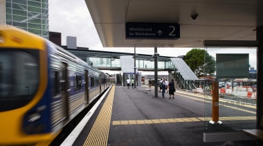 View of the Waitakere train station - View high speed rail, lane, metro station, metropolis, metropolitan area, passenger, public transport, rail transport, railroad car, rapid transit, residential area, rolling stock, track, train, train station, transport, urban area, vehicle, black