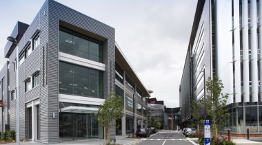 View of the civic center featuring extensive glazing apartment, architecture, building, commercial building, condominium, corporate headquarters, facade, headquarters, house, metropolitan area, mixed use, neighbourhood, real estate, residential area, white