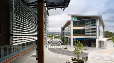 Waitakere Central is a commercial development comprising cutting-edge architecture, building, condominium, metropolitan area, structure, white, black