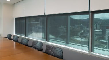 A view extrafloke blackout blinds used in office architecture, glass, interior design, window, window covering, gray