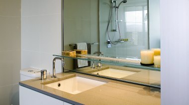 A view of the bathroom featuring  frameless architecture, bathroom, countertop, interior design, kitchen, room, sink, gray