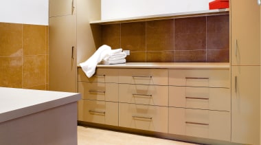 View of laundry featuring cabinetry from Splendor Kitchens. cabinetry, countertop, cuisine classique, floor, flooring, hardwood, interior design, kitchen, laminate flooring, plywood, property, real estate, room, tile, wood, wood flooring, white