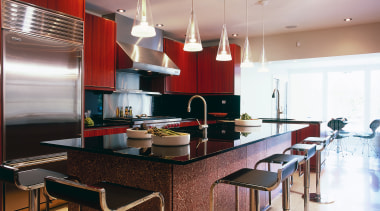 A view of this kitchen featuring terrazzo flooring, cabinetry, ceiling, countertop, interior design, kitchen, room, table, gray