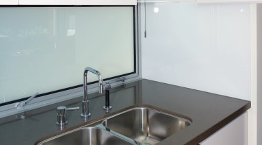 A view of some cabinetry by Trademark Kitchens. bathroom sink, countertop, kitchen, product design, sink, tap, white