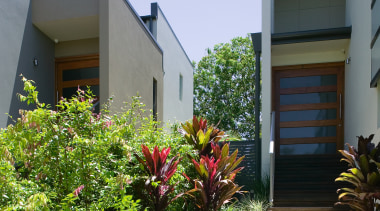 A view of some landscaping done by Eureka architecture, cottage, courtyard, estate, facade, garden, home, house, landscaping, plant, real estate, residential area, yard
