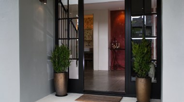 A view of some coloured concrete flooring from door, interior design, gray, white