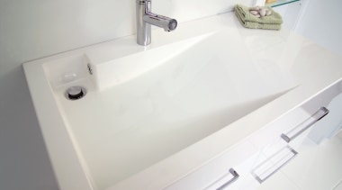 A view of a bathroom vanity from Architectural bathroom, bathroom accessory, bathroom cabinet, bathroom sink, ceramic, plumbing fixture, product, product design, sink, tap, toilet seat, white