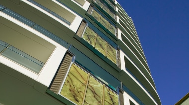 An exterior view of the Jade apartment tower angle, architecture, building, commercial building, condominium, corporate headquarters, daylighting, daytime, facade, headquarters, house, landmark, line, metropolitan area, mixed use, residential area, sky, skyscraper, tower block, blue, brown