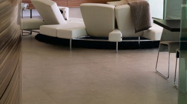 A view of this apartment featuring zMonaco Brown floor, flooring, furniture, hardwood, interior design, laminate flooring, living room, table, tile, wood, wood flooring, brown, gray