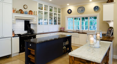 A view of this kitchen featuring tiled flooring, countertop, cuisine classique, interior design, kitchen, property, real estate, room, gray