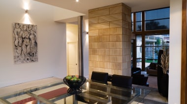 A view of the dining area featuring glass ceiling, interior design, living room, real estate, room, gray, brown