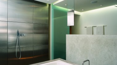 In this bathroom designed by Archis a Panosonic architecture, bathroom, bathtub, ceiling, daylighting, glass, interior design, lighting, real estate, room, wall, gray, white