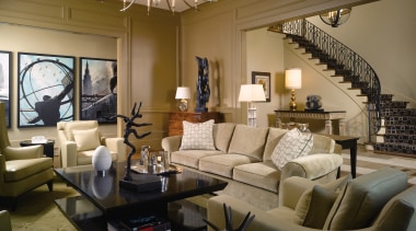 The pared-back interior has been given a definite ceiling, furniture, home, interior design, living room, room, brown