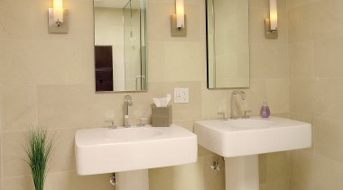 A view of this bathroom featuring dual vanities, bathroom, bathroom accessory, bathroom sink, floor, interior design, plumbing fixture, room, sink, tap, tile, orange