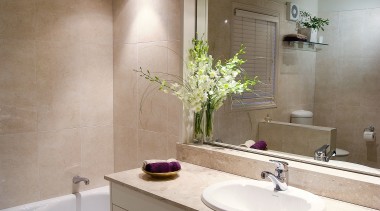 A view of a bathroom by Bathrom Direct. bathroom, bathroom accessory, bathroom cabinet, cabinetry, countertop, home, interior design, room, sink, brown, gray