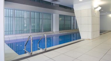 A view of the Precinct Apartments constructed by daylighting, glass, leisure centre, property, real estate, window, gray